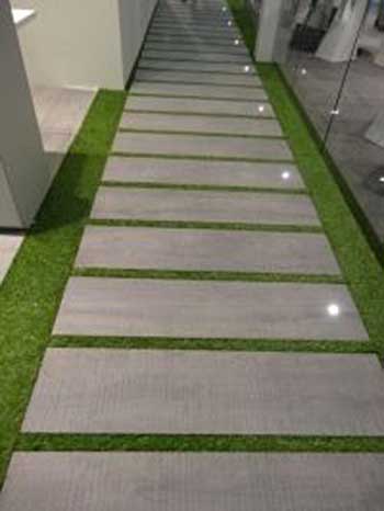 Diseño de jardín moderno, sendero de piedra con iluminación led para una zona de paso